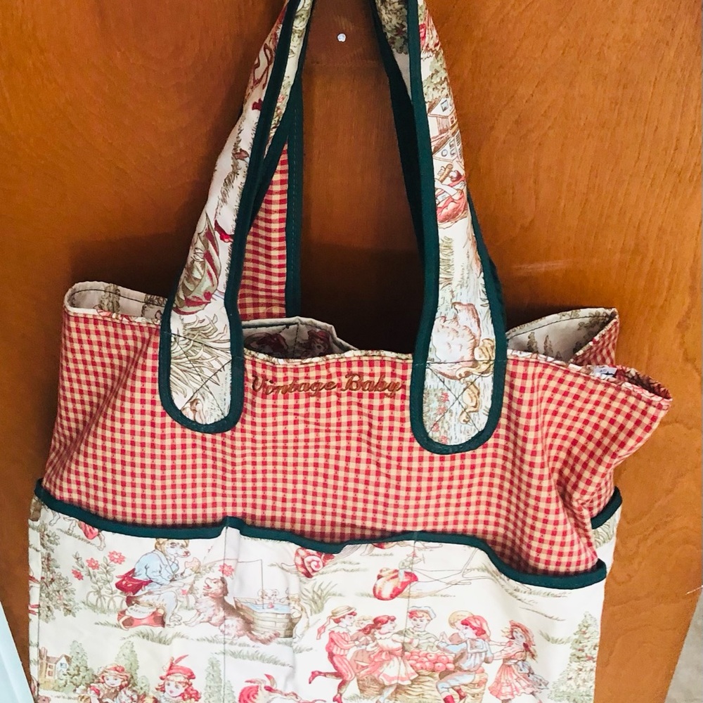 Designer baby bags . Made in America , cloth with hard bottom .